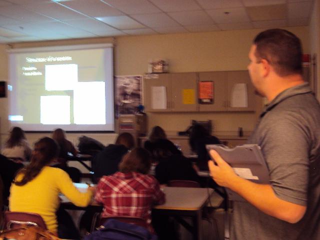 AP Psychology teacher Bill James teaches class with  his SmartBoard. 