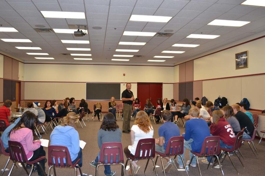 Mr. Collins shows new mentors the ropes on how to relate to mentees during a training session in the LGI on Sept. 28. These sessions help to make the mentors more comfortable  intrsutrcting the mentees.