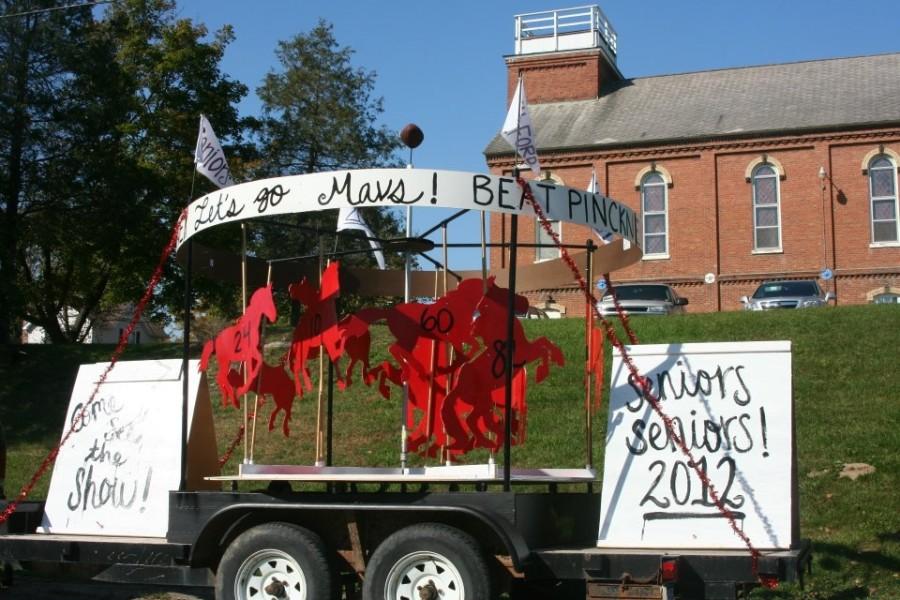 Senior Student Council members worked hard and diligently to build the winning float. 