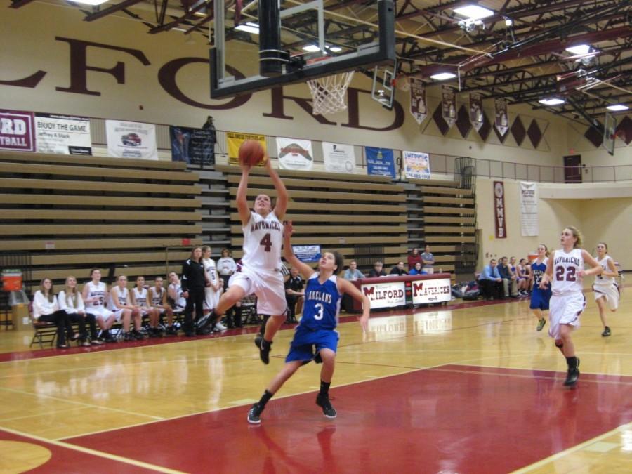 Senior Captain Claire Slaughter goes in for a lay-up against Lakeland on Thursday.  Slaughter led the team with 16 points.