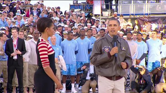 Photo Courtesy of the Associated Press.  President Obama gave a pre-game speech before the Carrier Classic to recognize the significance of the event.