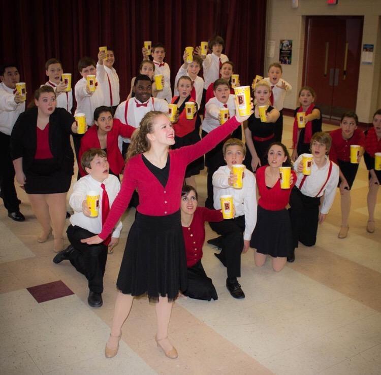 Center Stage carolers spread holiday cheer