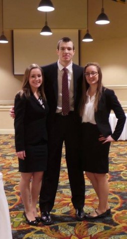 Alissa Ruder, Justin Kelly and Izzie Kenhard presenting the Business Plan