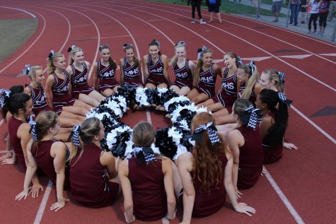 The girls circling up before the performance.