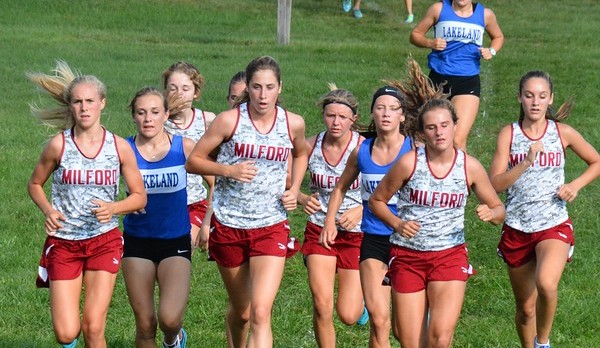 Girls cross country team running against Lakeland. 