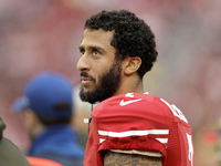 Colin Kaepernick after kneeling during the Nation Anthem