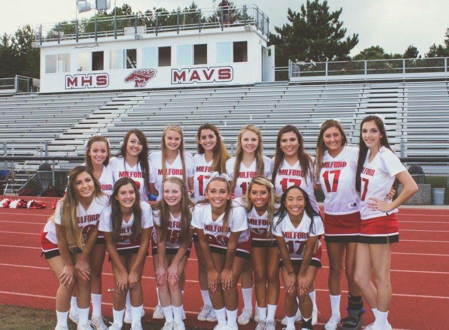 Milford girls love the thrill of cheering under the lights