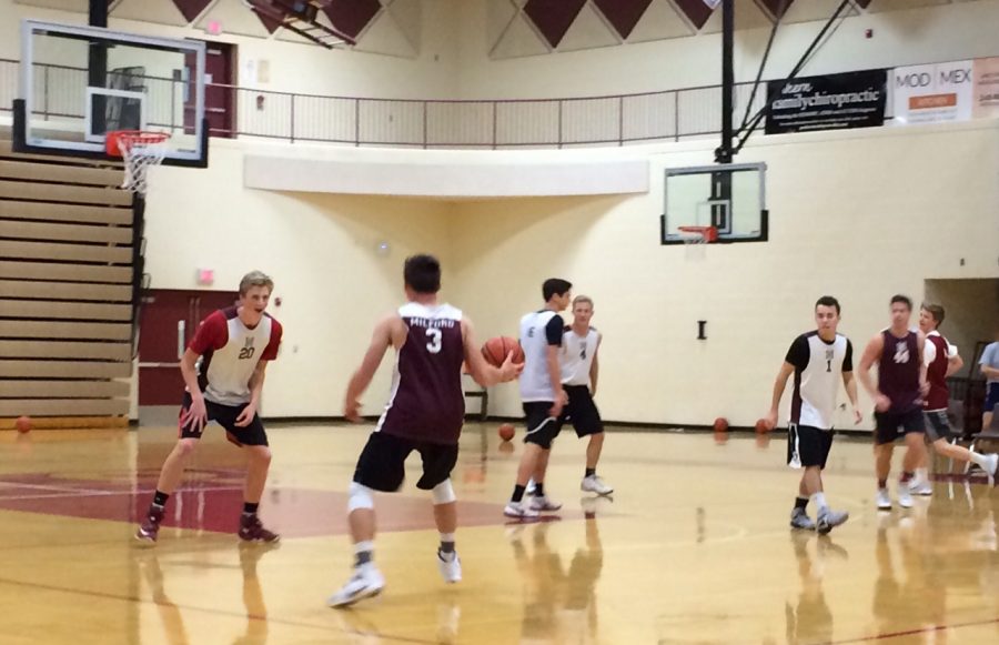 The varsity basketball team scrimaging during Maverick Madness to introduce the start of a new season.