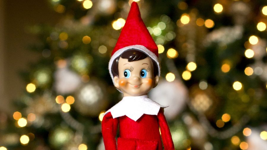 This photo provided by CCA&B, LLC, shows The Elf on the Shelf: A Christmas Tradition, with the Elf for the shelf. There is one hot item this holiday season that wont be resting under the Christmas tree. It will be on a shelf _ watching you. (AP Photo/CCA&B, LLC)