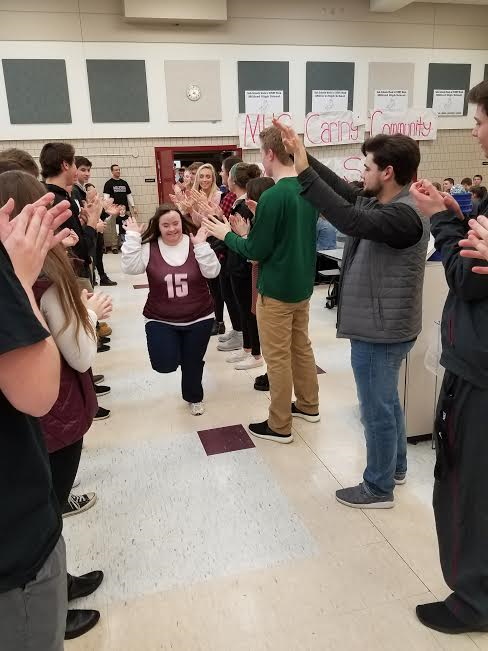 Special Olympians bring energy, applause to the Milford Fieldhouse