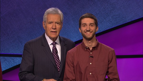 English teacher Nathan Flynn won Jeopardy on an episode that aired June 28th. Here he is pictured with Alex Trebek, the shows host. 