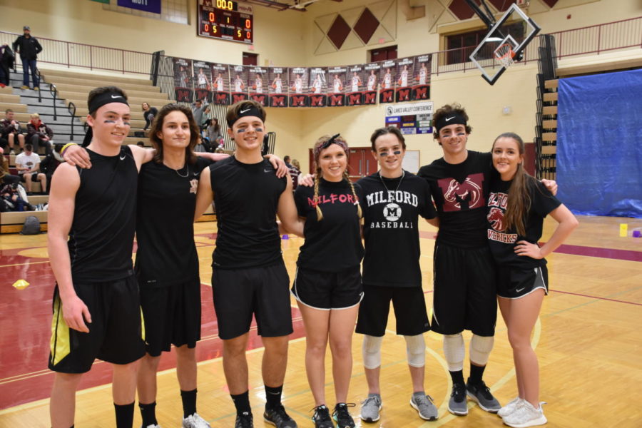 “Hard Targets,” posing after their win. (Left to Right) Chance Murray, Steven Gillingham, Tyler Knapp, Natalie Deland, Spencer O’Neil, Dylan Riggs and India Kenhard
