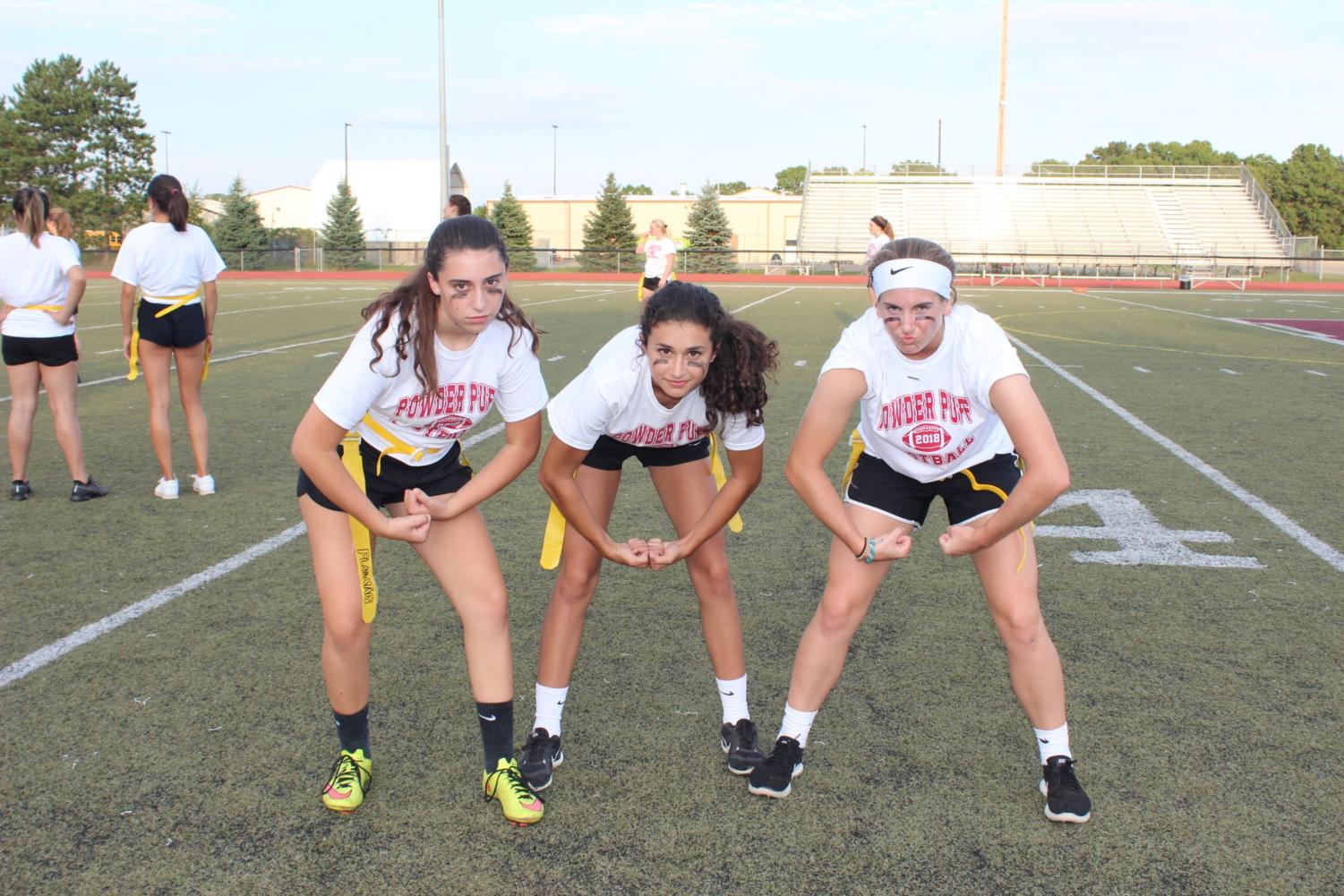(Left to right) Sophomores Sara Hockstad, Jaclyn Carrannanto, and Sammy Knapp getting pumped up before the big game. (Photos by Abby Knapp)