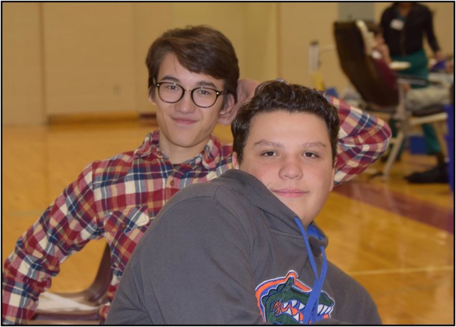 Charlie Dawe and Jayson Julian waiting to give blood.