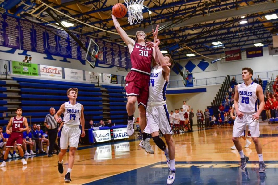 Gustafson with a monster dunk against Lakeland as a junior. Gustafson led the Mavs to their first win over Lakeland in three years as a senior. 
