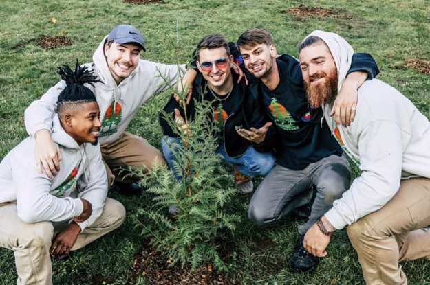 Mr. Beast and his friends planting the first tree.