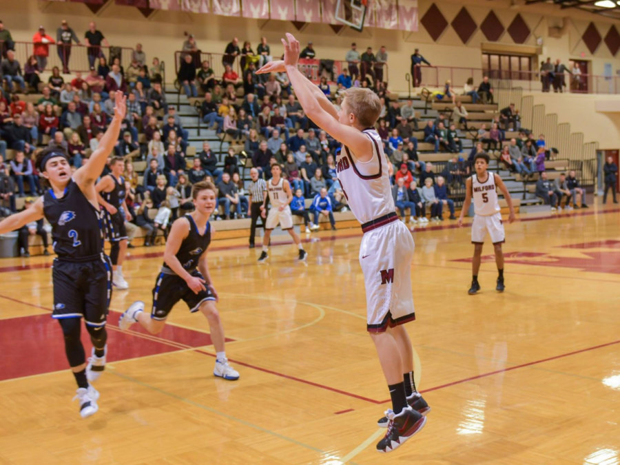 Senior Nick Krol shooting a 3-pointer against Lakeland last year
