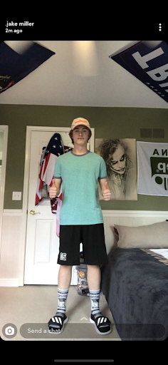 Pictured above is senior Jake Miller. He calls this quarantine look “Bottom of the drawer fit.” Miller is pictured wearing an outfit he put together with clothes that were, well, at the bottom of his drawer. Miller says his words of wisdom for his outfit choice was: “I think my closets bipolar because it kept throwing fits at me.” 