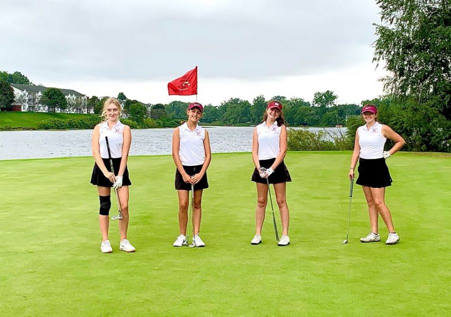 (Left to right) Senior Devin Chaldecott, sophomore Caroline Colt, senior Sadie Guffy and sophomore Ava Moore at the Oakland County Tournament at The Links at Crystal Lake.