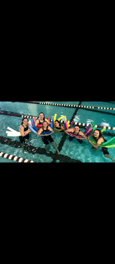 On their last Saturday practice of the season, the girls floated on pool noodles during rest portions of high-intensity interval sprint sets.