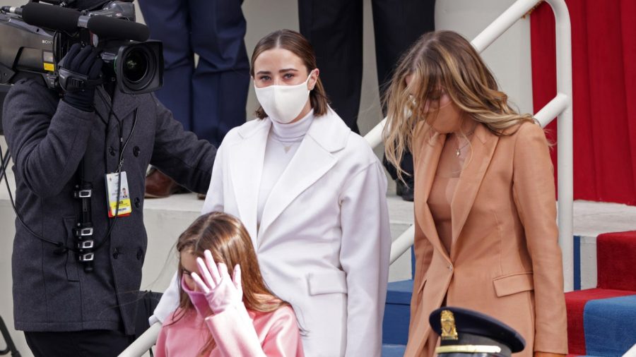 Finnegan, Naomi and Natalie Biden walking down the Capitol steps to the Inauguration.