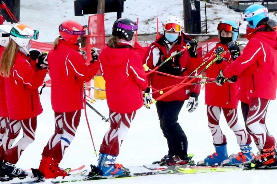 The Mavs go over inspection plans at the bottom of the hill (Photo courtesy of Resa Abbey).