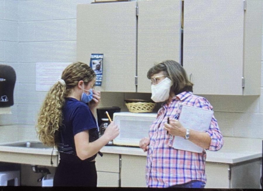 Sophomore Peyton Wheeler chats with Vocal Director Maryann Lambrecht at a pre-audition workshop.