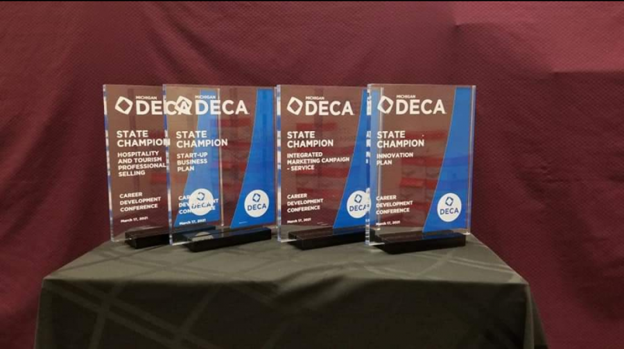 Many+DECA+members+won+medals+for+their+achievements%2C+and+state+champions+won+DECA+glass+to+commemorate+their+achievement+and+potential+to+compete+at+the+international+level+%28Photo+courtesy+of+Kaye+Sommer%29.++