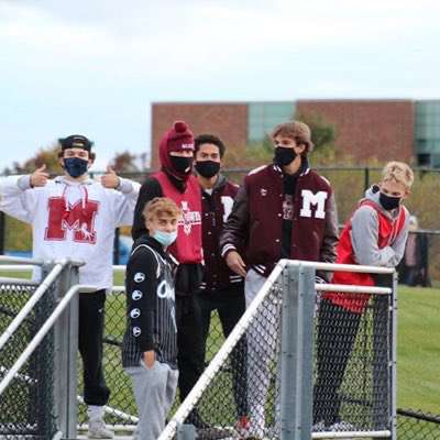 In past years, seniors have been at the forefront of student sections at football games and other sporting events, cheering on MHS’ student athletes (Photo courtesy of Bruce Maverick). 
