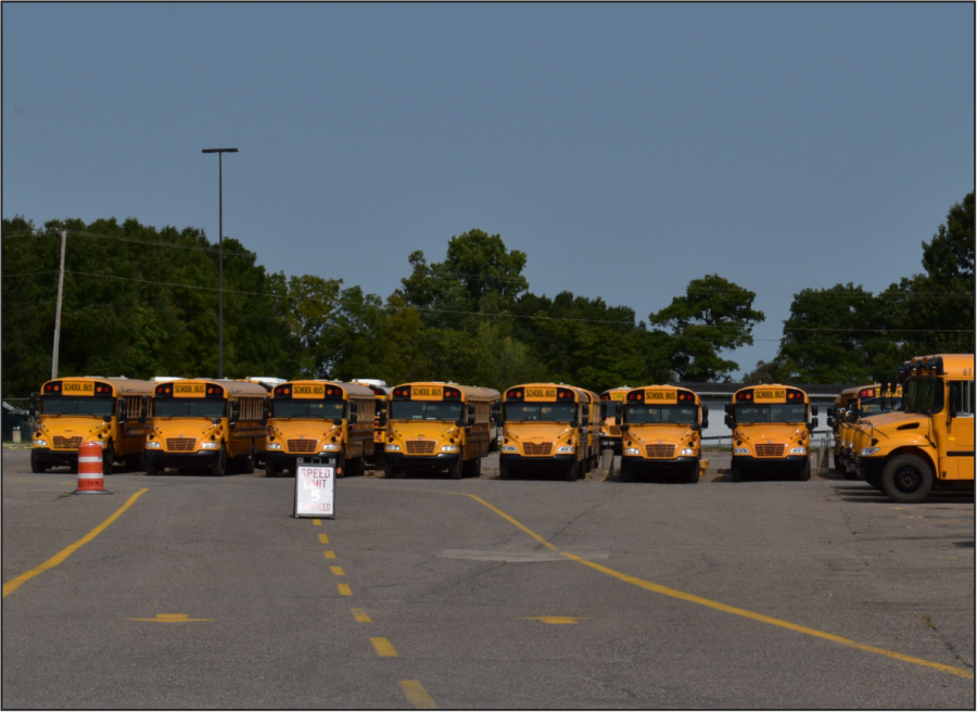 Huron+Valley+Schools+buses+parked+in+the+lot+at+Milford+High+School.