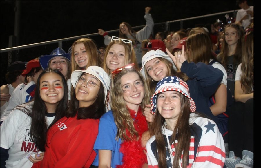 Alexis Weber, Samantha Laughrey, Lauren Laughrey, Taylor Mitchell, Faith Scarcelli,              Maria Castillo, Kathleen Fulton, and Elizabeth Park cheer for their football players after a year of game-less Friday nights