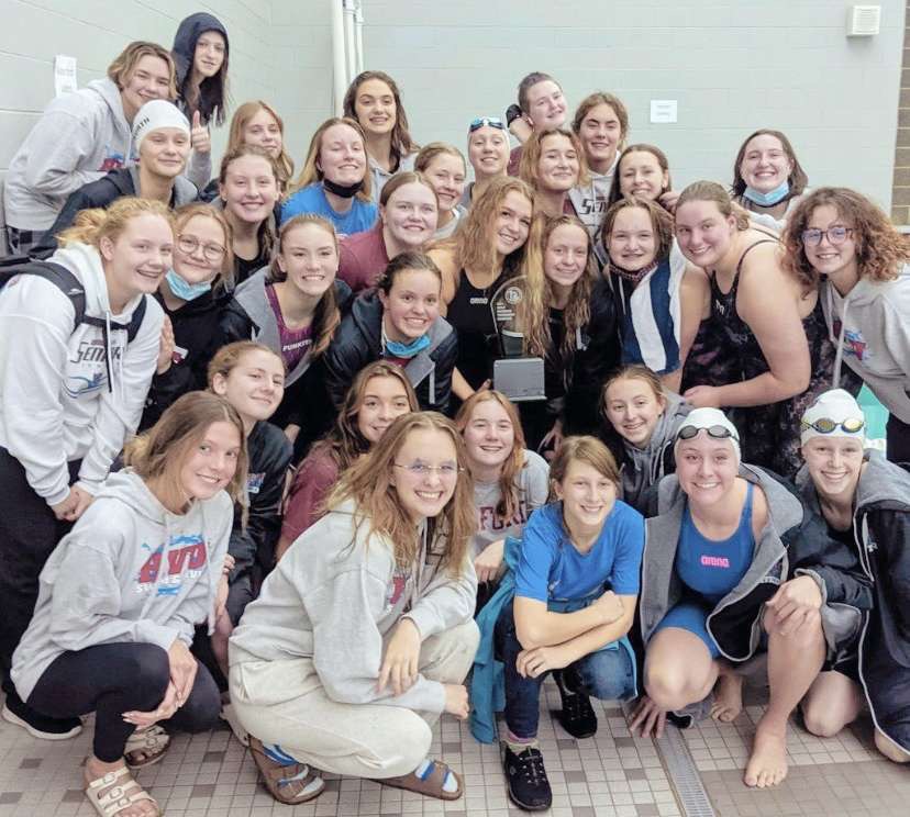 HVU+Swim+%26+Dive+with+the+Championship+trophy+after+winning+the++meet+by+58+points+and+becoming+Co-Champs+with+Walled+Lake+United.%0A