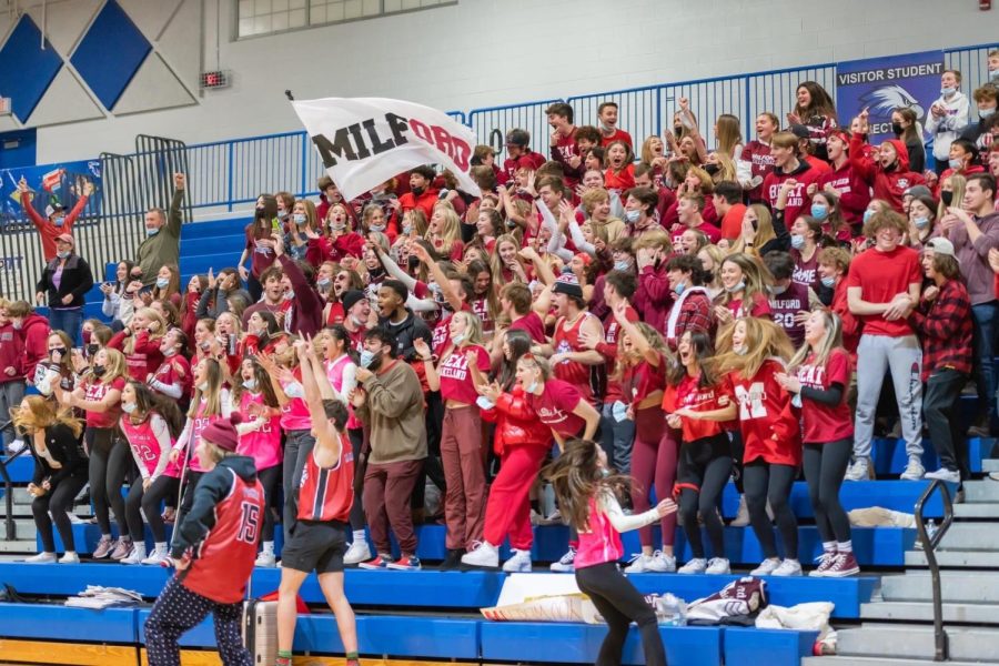 The student section celebrates Milford’s win over Lakeland after the miracle shot goes in.