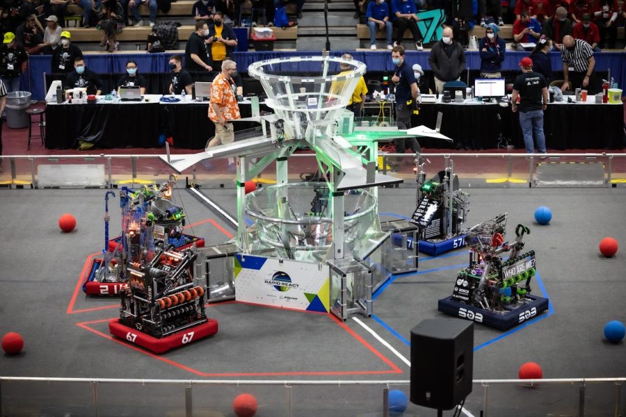 The HOT team’s robot (67) competes by shooting balls into the center basket. The team was the top seed in the tournament after an impressive showing during the preliminary round 