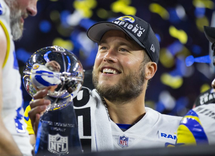 Rams Quarterback Matthew Stafford holding the Lombardi trophy after their win over the Bengals 23-20 (Photo courtesy of USA Today).