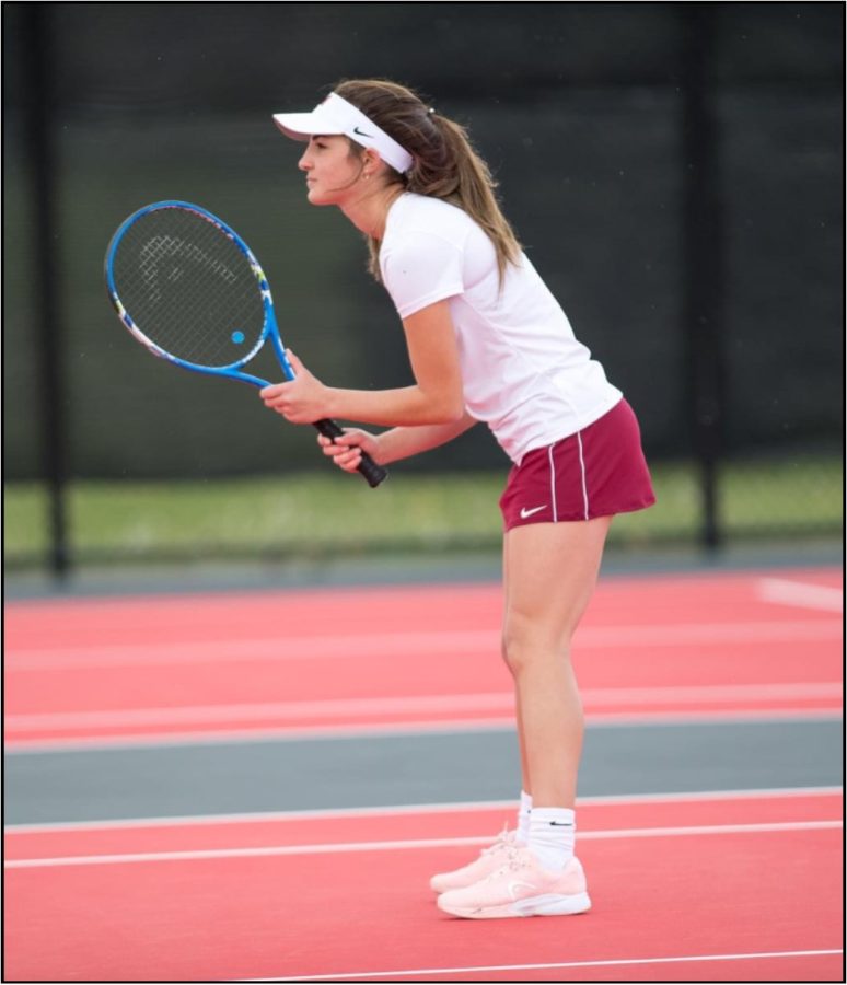 Senior Maddie Melody on the tennis courts.