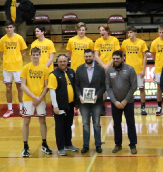 Justin Williams earned 8 varsity letters in basketball, Cross Country, and Track & Field. Major accomplishments include player of the year during the 1998 Kensington Valley Conference, 2-time KVC champion, and 1998 All-lakes Area Player of the year.

