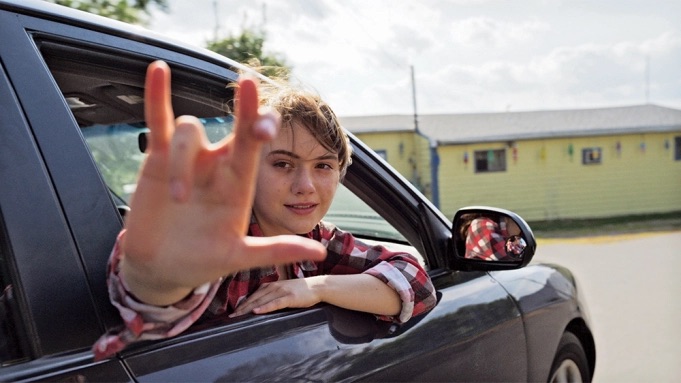 Actress Emilia Jones signs “I really love you” in the movie CODA. CODA is nominated for Best Picture at the 2022 Academy Awards (Photo courtesy of Variety.com).