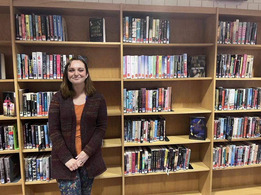 Fallon Pawley has been reorganizing Milford’s collection, and slowly updating books throughout our library (Photo by Maddie Melody).