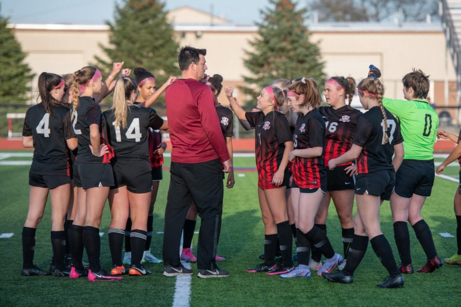 Coach+Hipple+leading+the+Girl%E2%80%99s+Varsity+soccer+team+in+their+pre-game+chant.