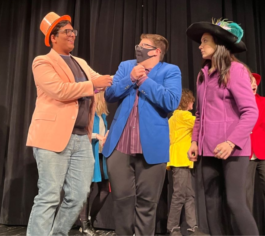 Performers Ryan Syeed (left),  Ben Sanko (middle), and Aubrey Snavley (right) work on a scene from the show (Photos courtesy of Julia Kanak).