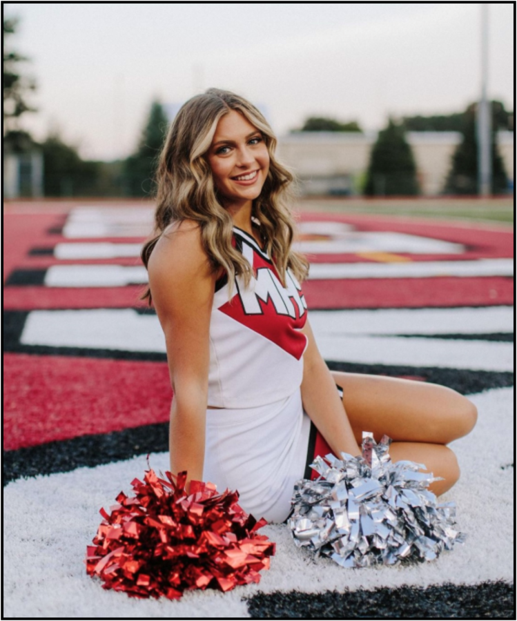 Ella in her cheer uniform 