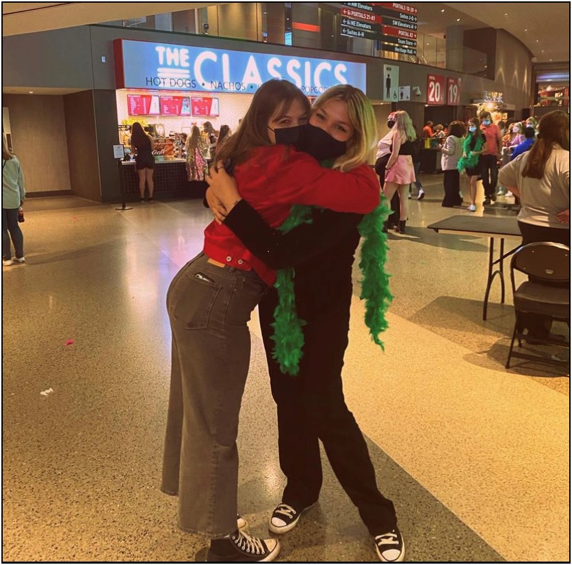 Juniors Grace Cox (left) and Sophia Jobe (right) pose at the Harry Styles concert 