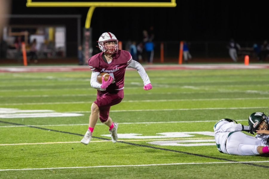 Senior cornerback Josh Tobias returning a punt on senior night against Waterford Kettering 