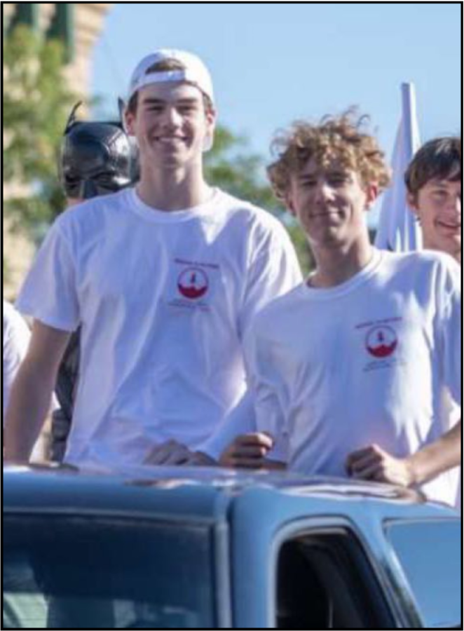 Seniors Zach Koby and Sam Lewis in the Homecoming Parade. 
