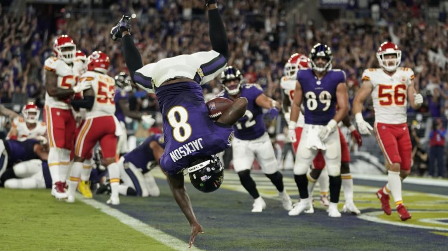 Lamar Jackson flipping into the endzone to score a touchdown against the Kansas City Chiefs 