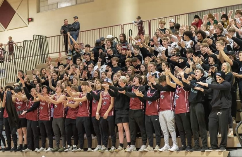 Sixth Man and student section cheer on Milford as they face Waterford Mott.