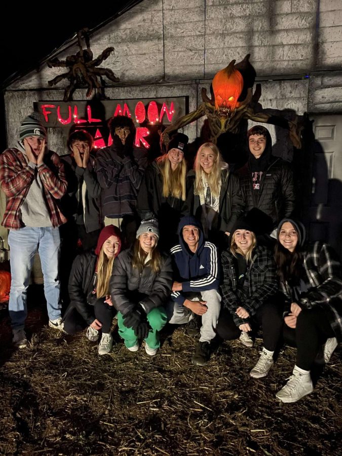 Group of Milford Seniors visiting Bonadeos haunted house and forest.