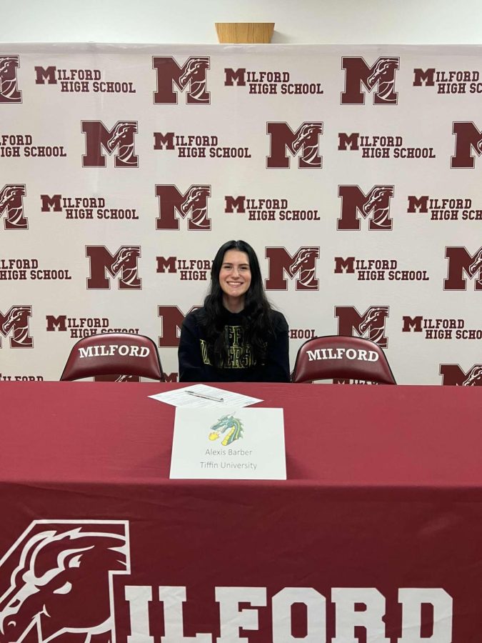 Lexi Barber on her signing day to Tiffin University