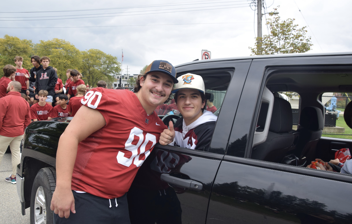 Max Winnie (left) and Stevan Vujic (right) at the Homecoming Parade.